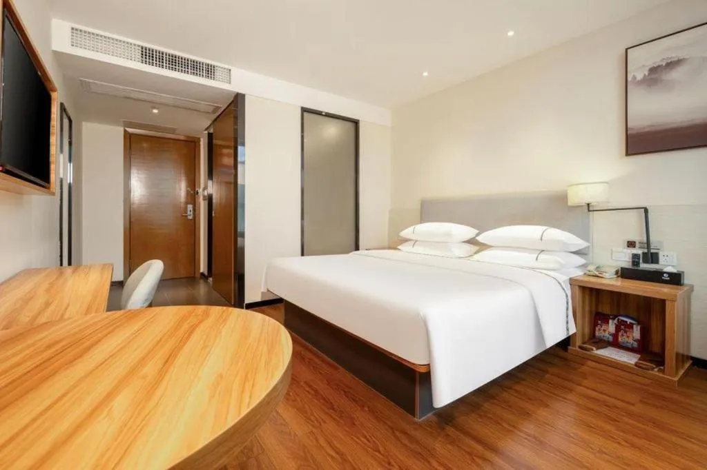 Bed in JTOUR Inn Hechi Yizhou Municipal Central Plaza