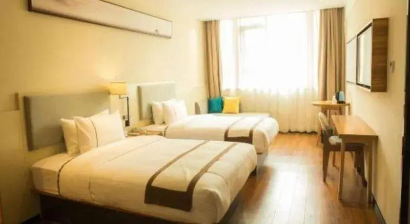 Bed in JTOUR Inn Hechi Yizhou Municipal Central Plaza Bed in JTOUR Inn Hechi Yizhou Municipal Central Plaza