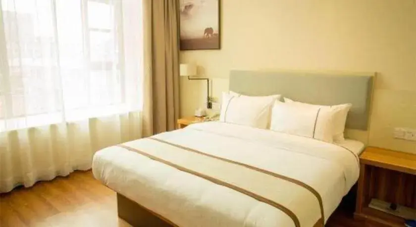 Bed in JTOUR Inn Hechi Yizhou Municipal Central Plaza Bed in JTOUR Inn Hechi Yizhou Municipal Central Plaza