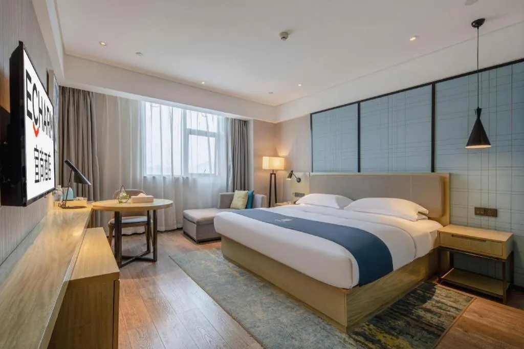 Bed in Echarm Hotel Nanning Chaoyang Square River View