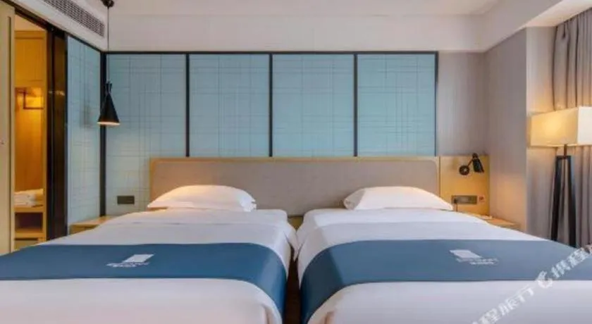 Bed in Echarm Hotel Nanning Chaoyang Square River View