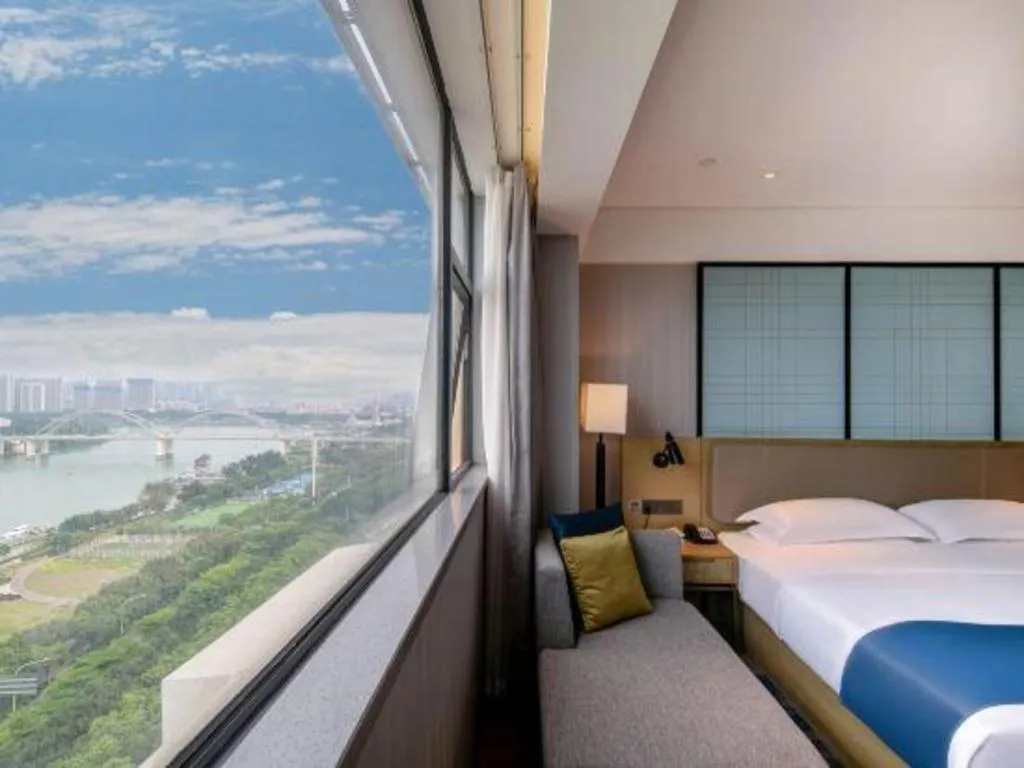 Bed in Echarm Hotel Nanning Chaoyang Square River View