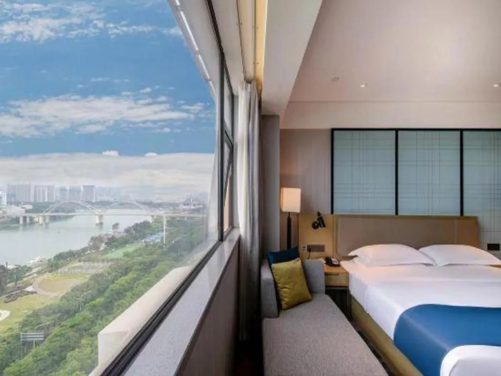 Bed in Echarm Hotel Nanning Chaoyang Square River View
