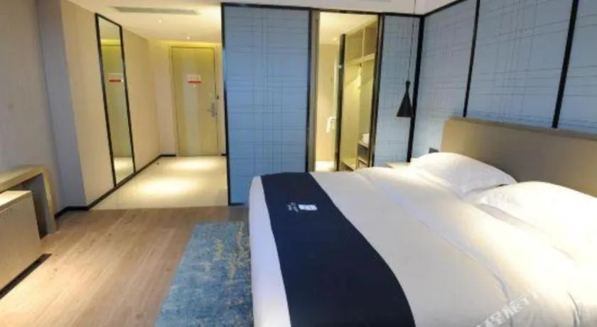 Bed in Echarm Hotel Nanning Chaoyang Square River View