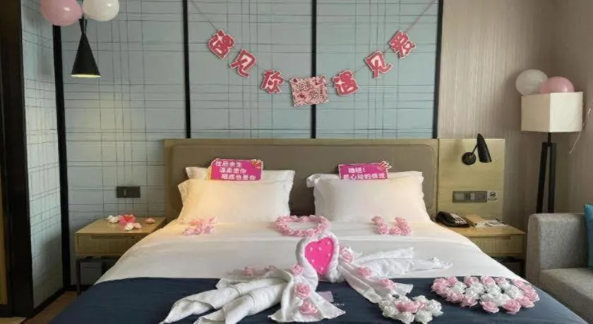 Bed in Echarm Hotel Nanning Chaoyang Square River View