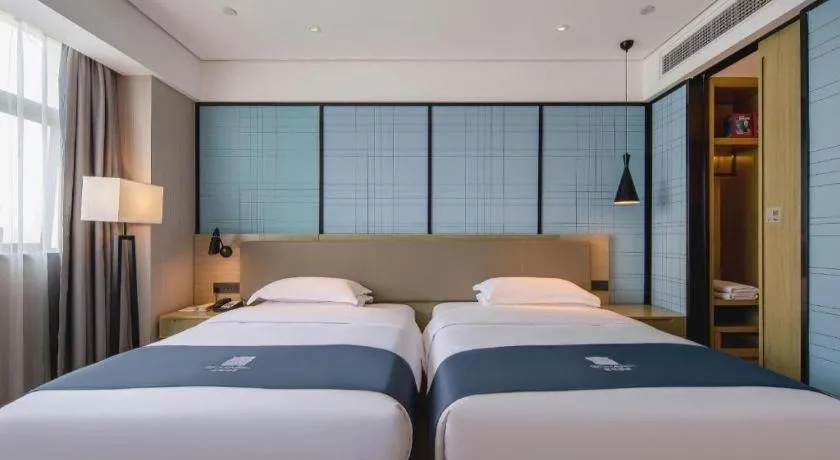 Bed in Echarm Hotel Nanning Chaoyang Square River View