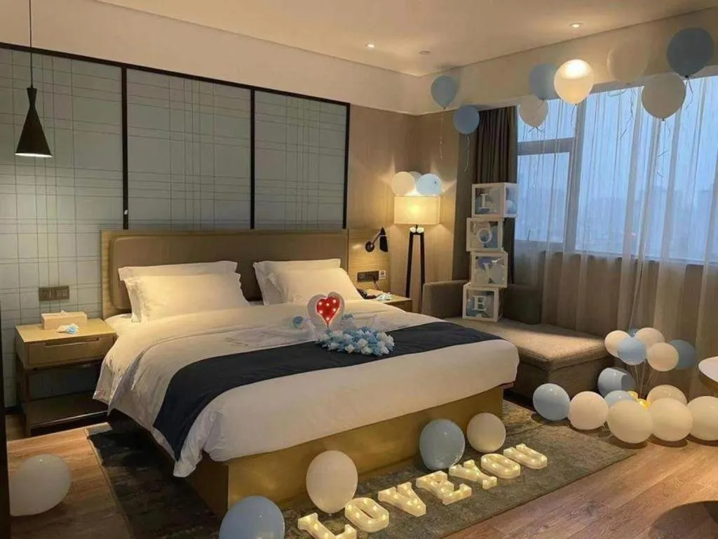 Bed in Echarm Hotel Nanning Chaoyang Square River View