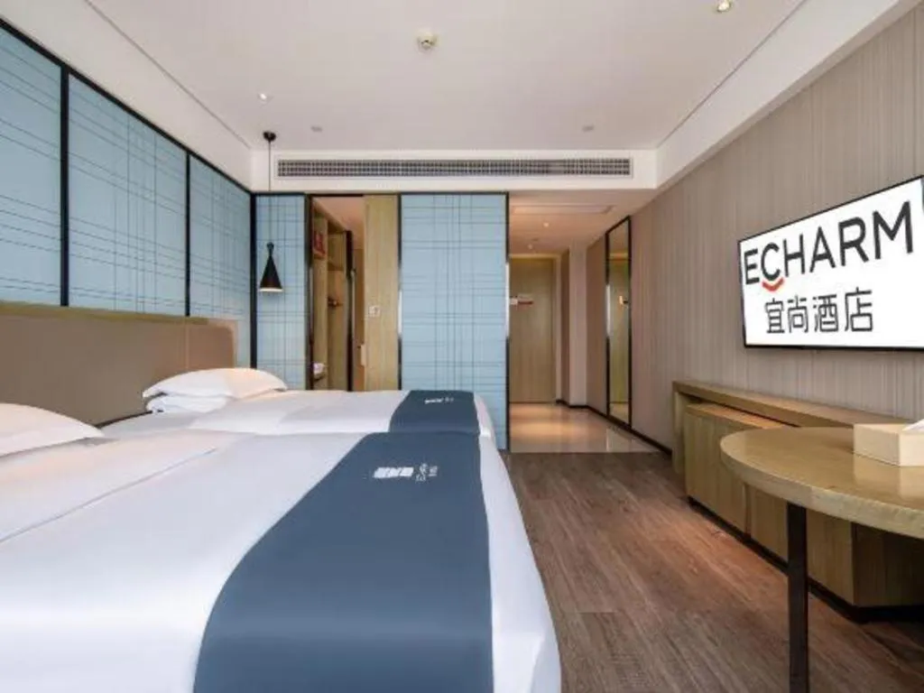 Bed in Echarm Hotel Nanning Chaoyang Square River View