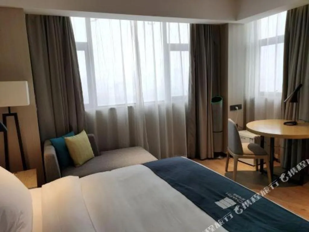 Bed in Echarm Hotel Nanning Chaoyang Square River View