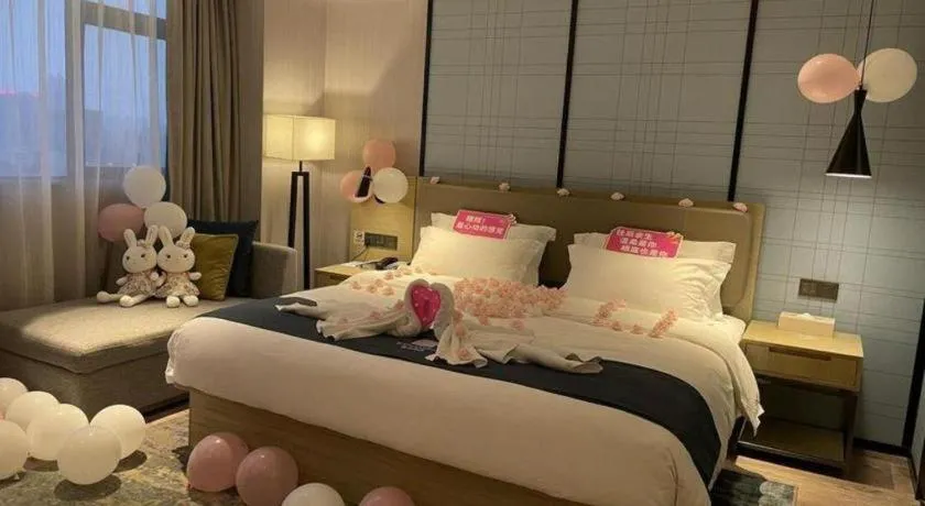 Bed in Echarm Hotel Nanning Chaoyang Square River View