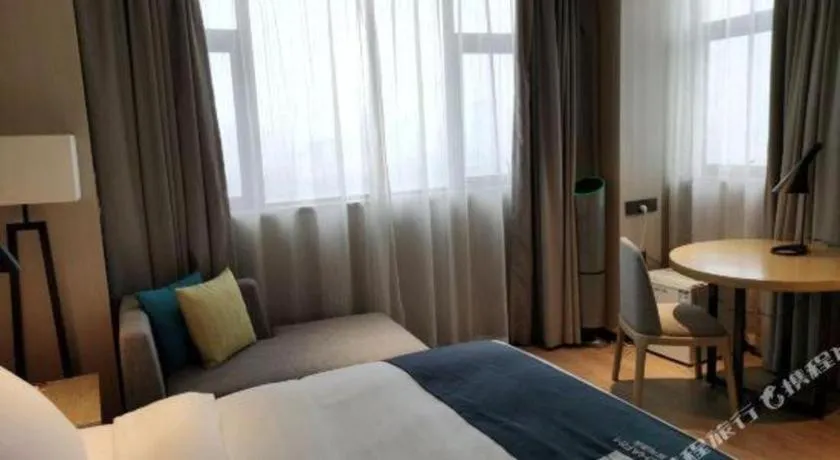 Bed in Echarm Hotel Nanning Chaoyang Square River View