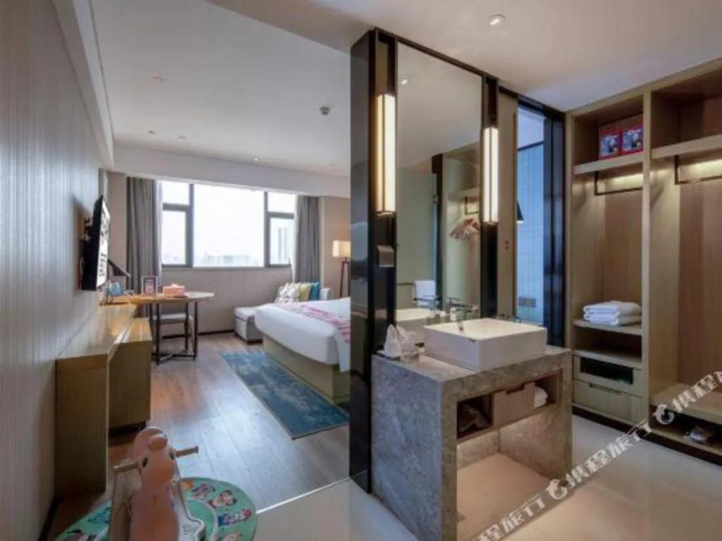 Bed in Echarm Hotel Nanning Chaoyang Square River View