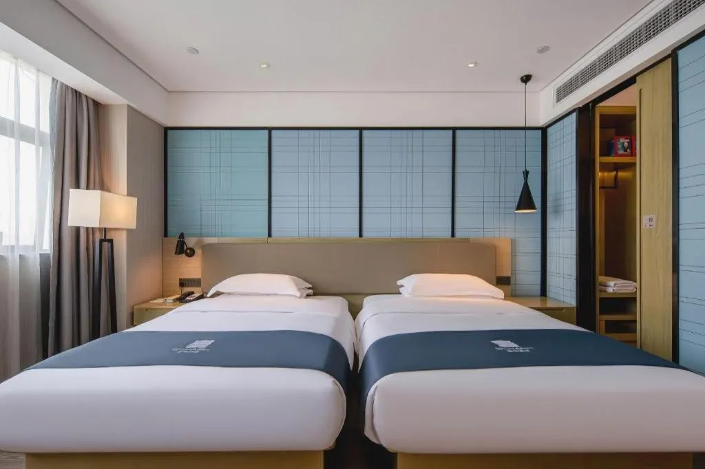 Bed in Echarm Hotel Nanning Chaoyang Square River View
