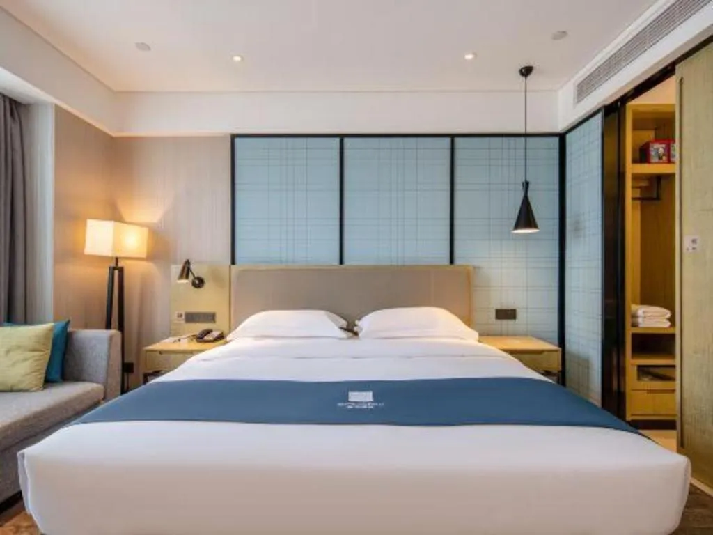 Bed in Echarm Hotel Nanning Chaoyang Square River View