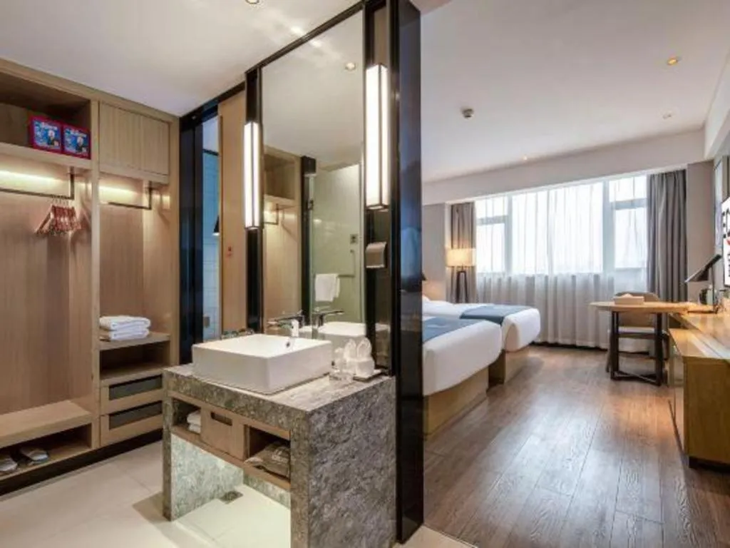 Bed in Echarm Hotel Nanning Chaoyang Square River View