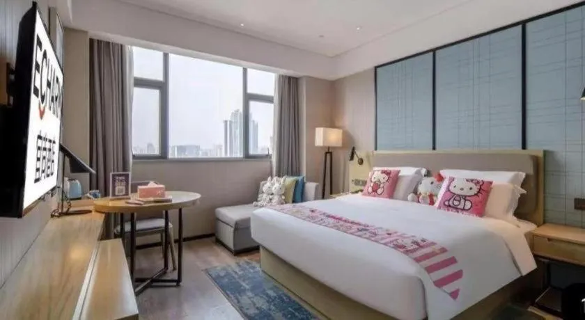 Bed in Echarm Hotel Nanning Chaoyang Square River View