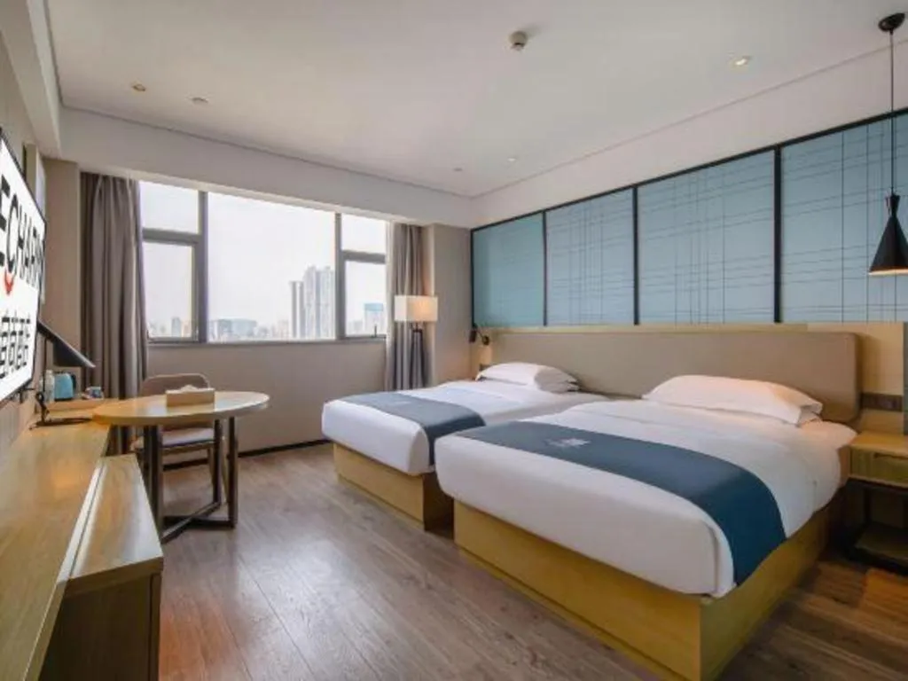 Bed in Echarm Hotel Nanning Chaoyang Square River View