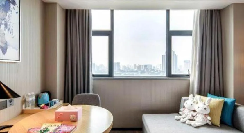 Bed in Echarm Hotel Nanning Chaoyang Square River View