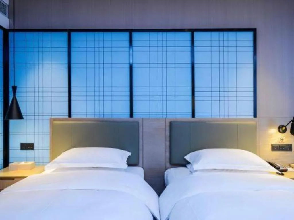 Bed in Echarm Hotel Anshun High-speed Railway Station Jichang Road