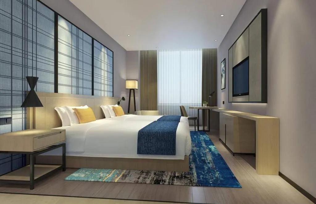 Bed in Echarm Hotel Anshun High-speed Railway Station Jichang Road