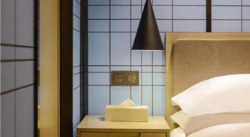 Bed in Echarm Hotel Anshun High-speed Railway Station Jichang Road