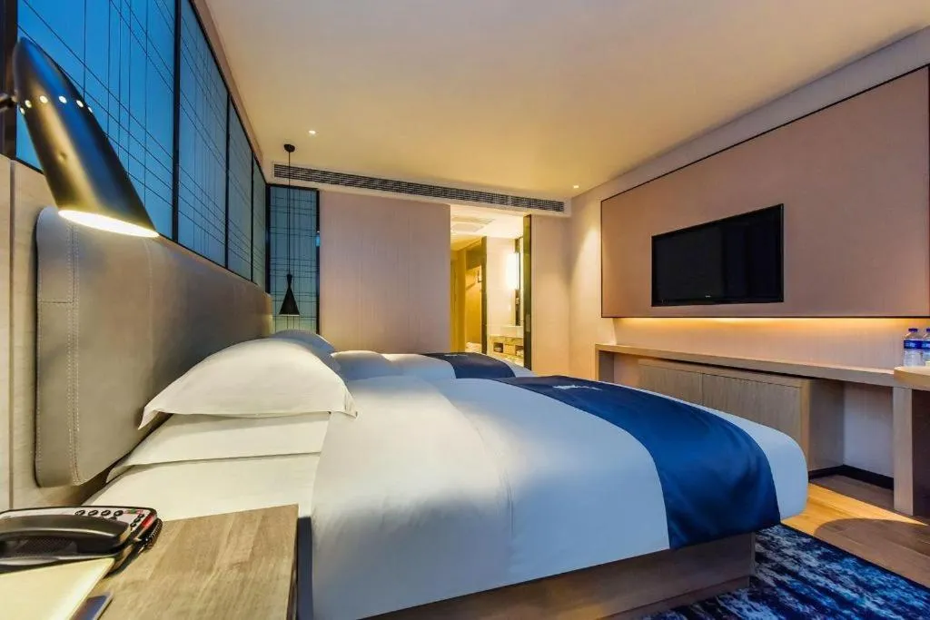 Bed in Echarm Hotel Anshun High-speed Railway Station Jichang Road