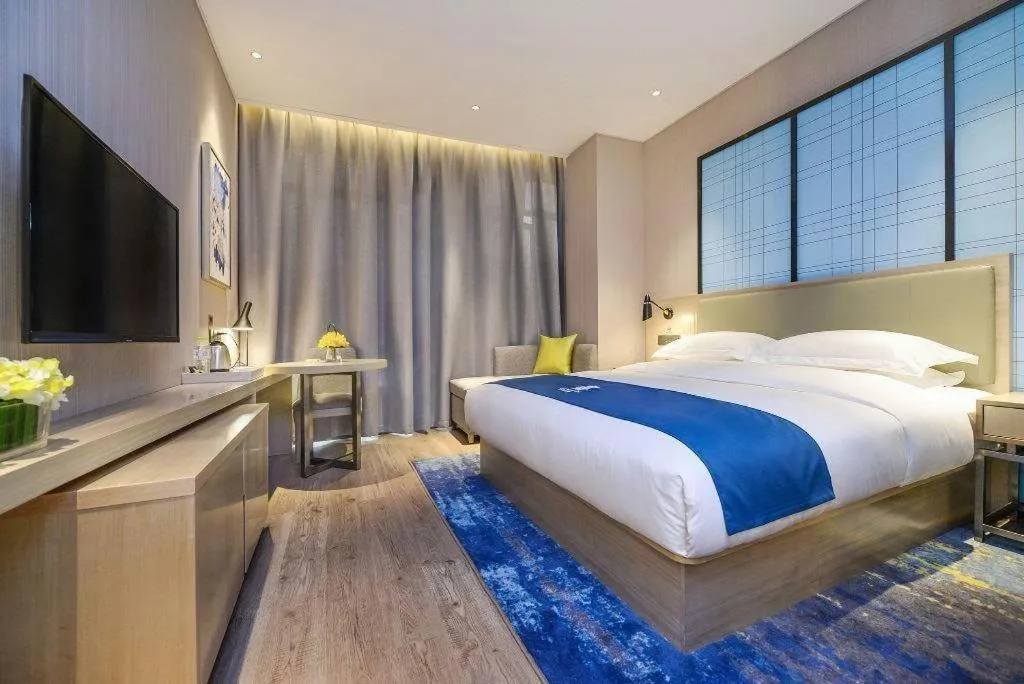 Bed in Echarm Hotel Anshun High-speed Railway Station Jichang Road