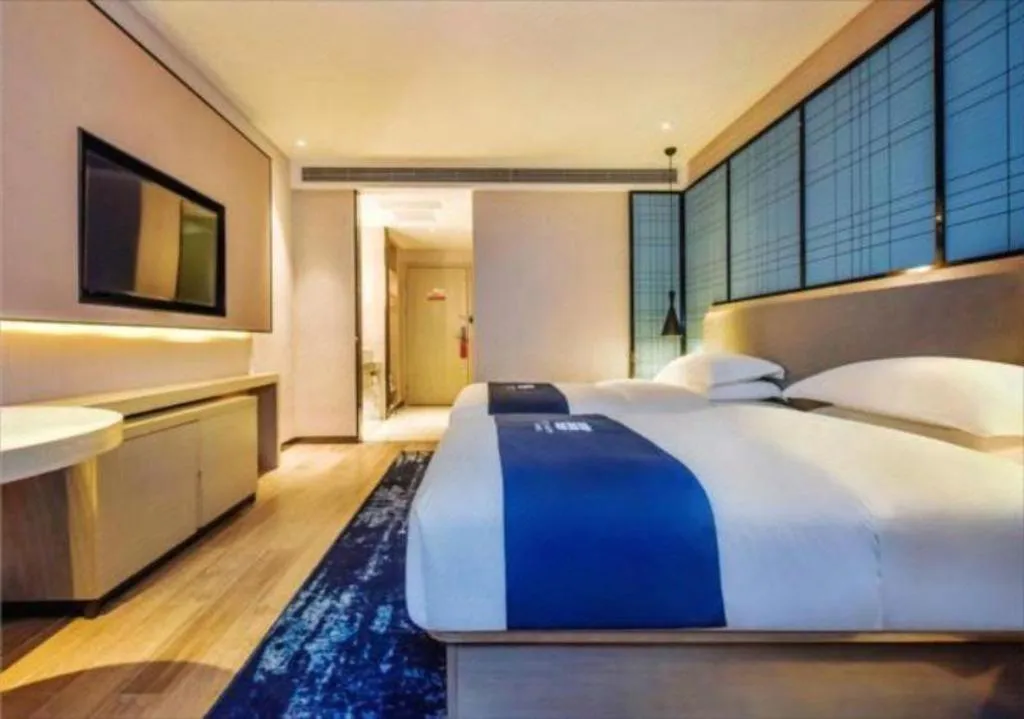Bed in Echarm Hotel Anshun High-speed Railway Station Jichang Road