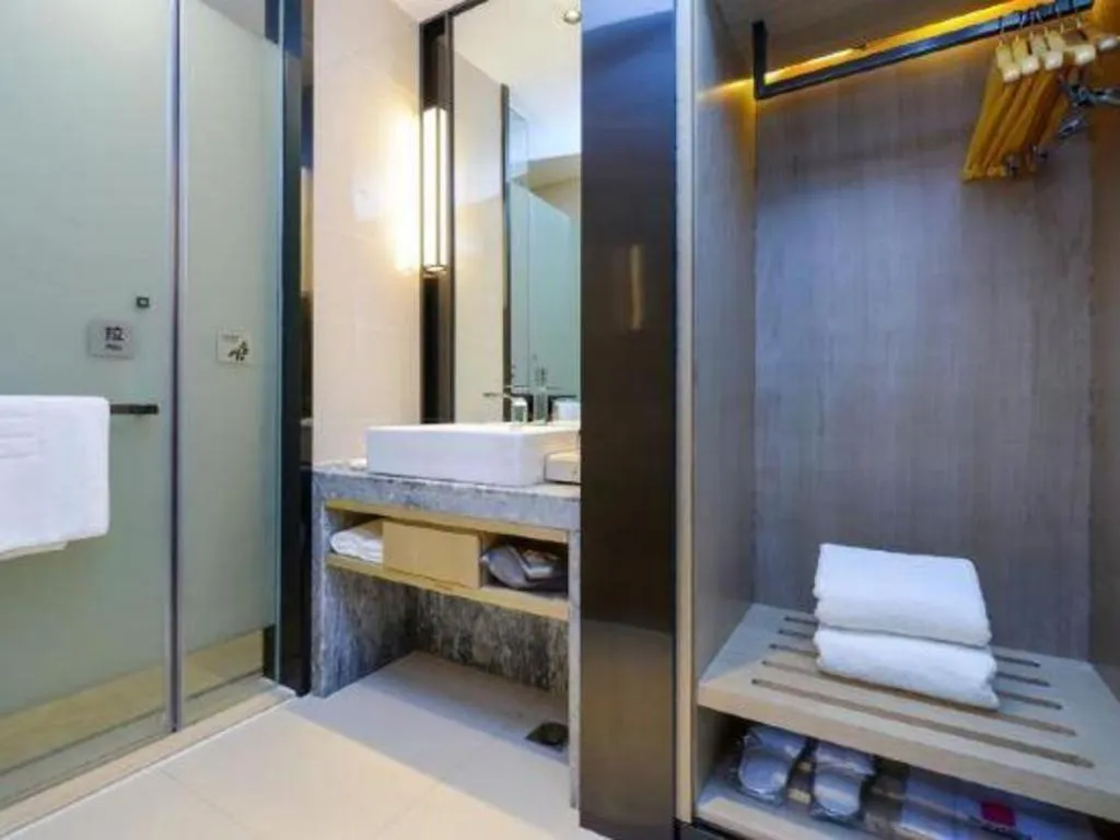 Bed in Echarm Hotel Anshun High-speed Railway Station Jichang Road