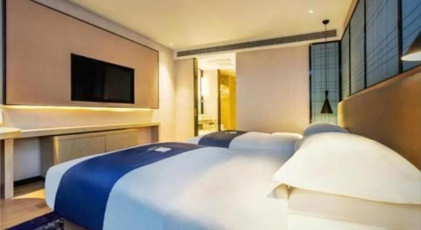 Bed in Echarm Hotel Anshun High-speed Railway Station Jichang Road