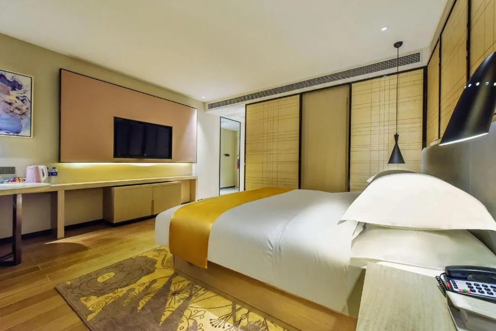 Bed in Echarm Hotel Anshun High-speed Railway Station Jichang Road