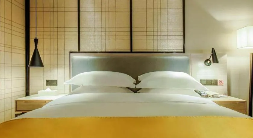 Bed in Echarm Hotel Anshun High-speed Railway Station Jichang Road
