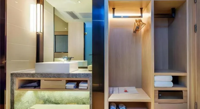 Bed in Echarm Hotel Anshun High-speed Railway Station Jichang Road