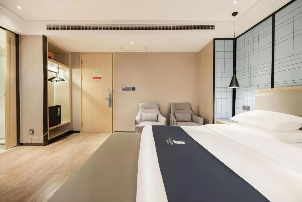 Bed in Echarm Hotel Wuhan Hankou Station Changgang Road Metro Station