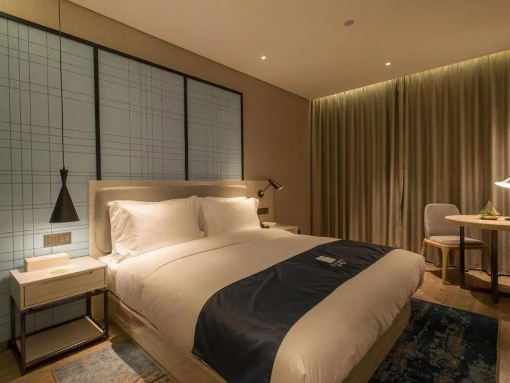 Bed in Echarm Hotel Wuhan Hankou Station Changgang Road Metro Station