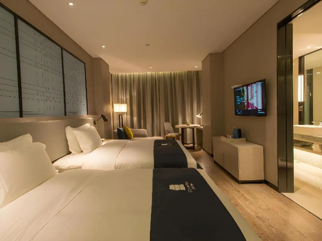 Bed in Echarm Hotel Wuhan Hankou Station Changgang Road Metro Station