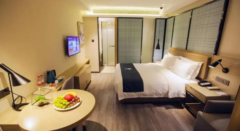 Bed in Echarm Hotel Nanning Guangxi University Xinyang Longteng District Maternal and Child Hospital Bed in Echarm Hotel Nanning Guangxi University Xinyang Longteng District Maternal and Child Hospital