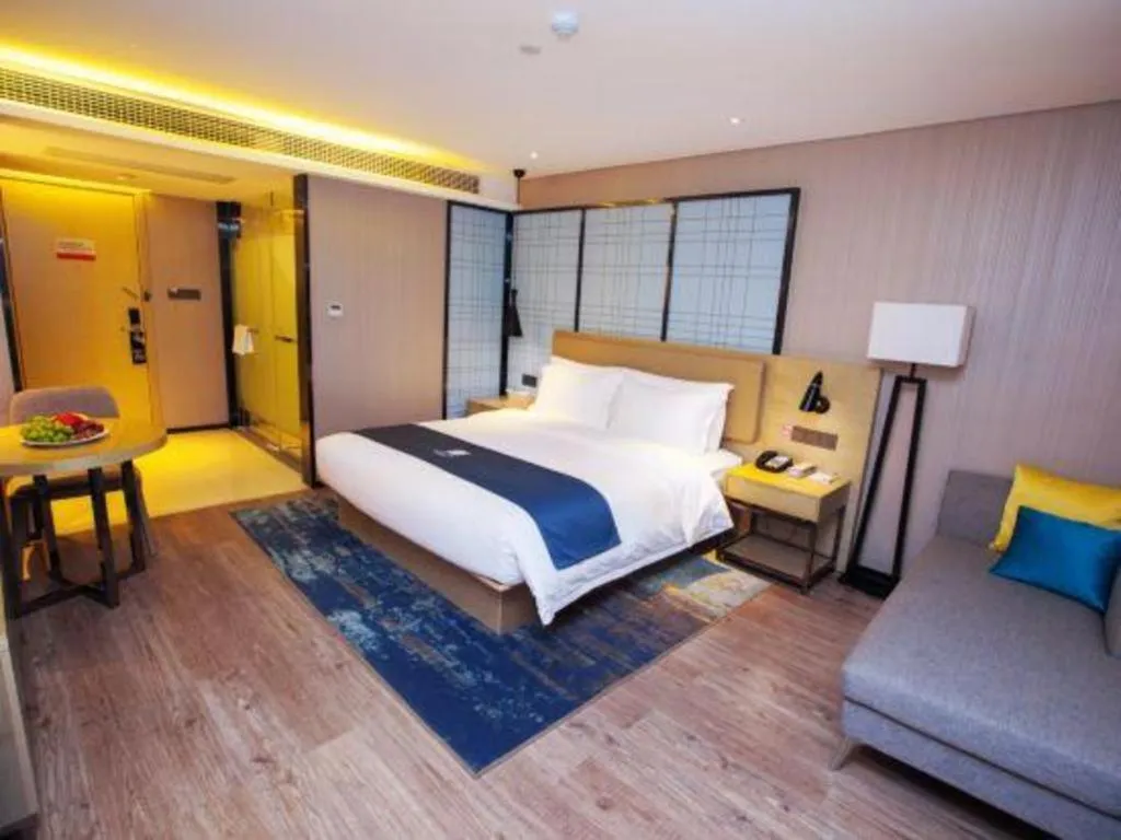 Bed in Echarm Hotel Nanning Guangxi University Xinyang Longteng District Maternal and Child Hospital