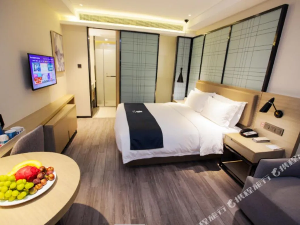 Bed in Echarm Hotel Nanning Guangxi University Xinyang Longteng District Maternal and Child Hospital