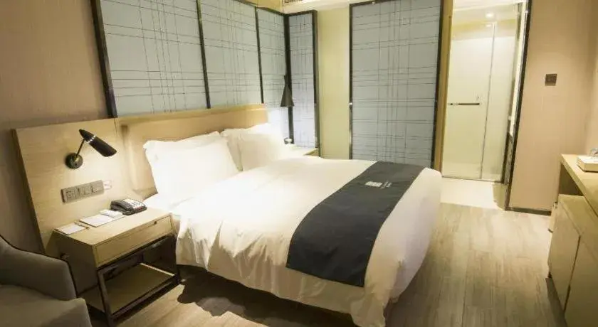 Bed in Echarm Hotel Nanning Guangxi University Xinyang Longteng District Maternal and Child Hospital Bed in Echarm Hotel Nanning Guangxi University Xinyang Longteng District Maternal and Child Hospital