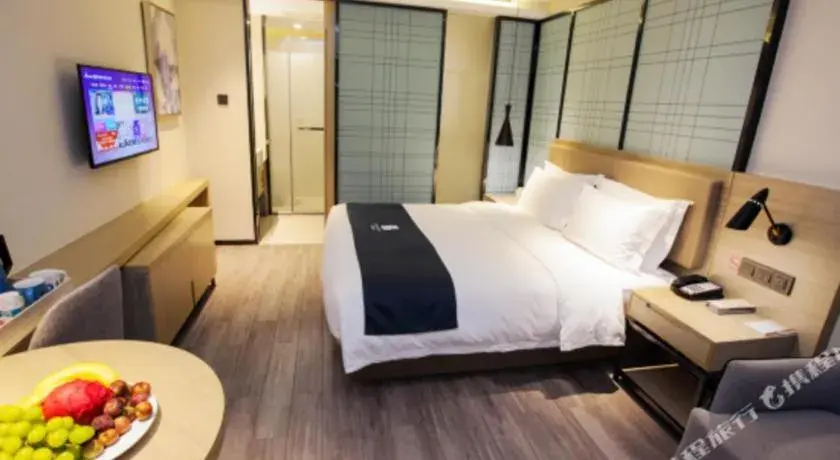 Bed in Echarm Hotel Nanning Guangxi University Xinyang Longteng District Maternal and Child Hospital Bed in Echarm Hotel Nanning Guangxi University Xinyang Longteng District Maternal and Child Hospital
