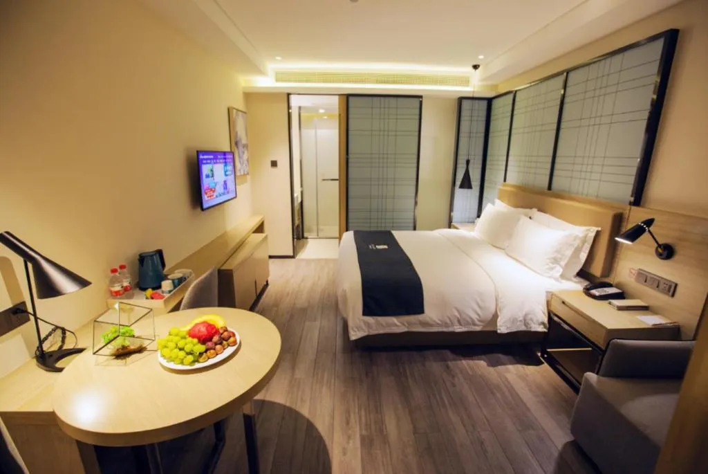 Bed in Echarm Hotel Nanning Guangxi University Xinyang Longteng District Maternal and Child Hospital