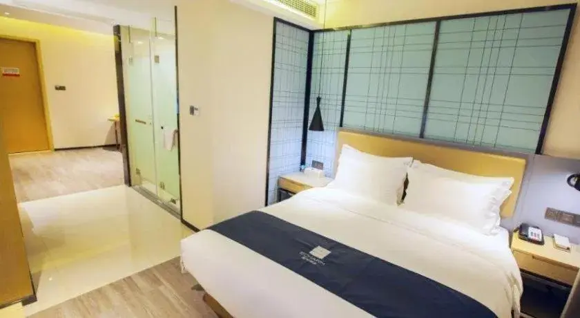 Bed in Echarm Hotel Nanning Guangxi University Xinyang Longteng District Maternal and Child Hospital Bed in Echarm Hotel Nanning Guangxi University Xinyang Longteng District Maternal and Child Hospital