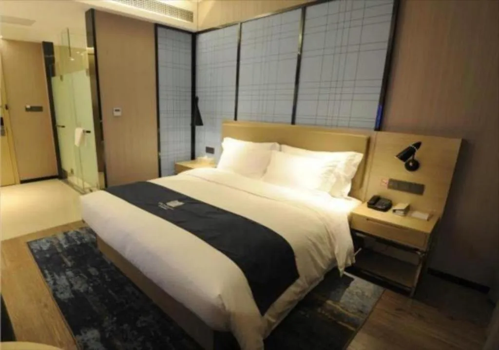 Bed in Echarm Hotel Nanning Guangxi University Xinyang Longteng District Maternal and Child Hospital