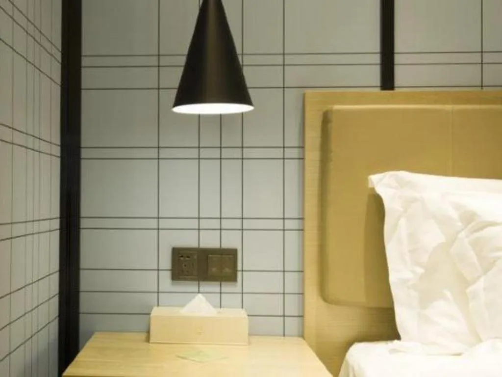 Bed in Echarm Hotel Nanning Guangxi University Xinyang Longteng District Maternal and Child Hospital