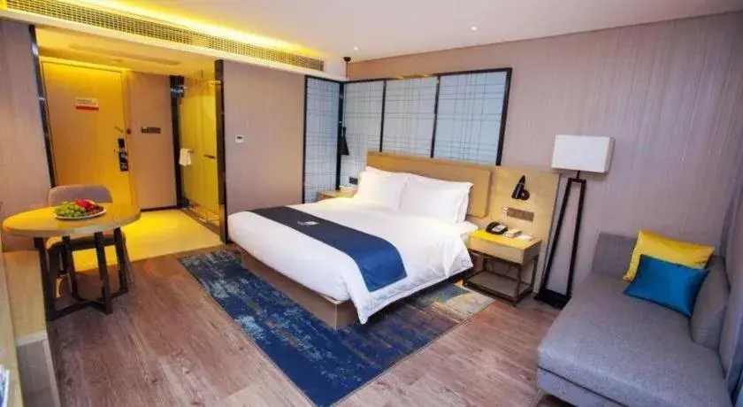 Bed in Echarm Hotel Nanning Guangxi University Xinyang Longteng District Maternal and Child Hospital Bed in Echarm Hotel Nanning Guangxi University Xinyang Longteng District Maternal and Child Hospital