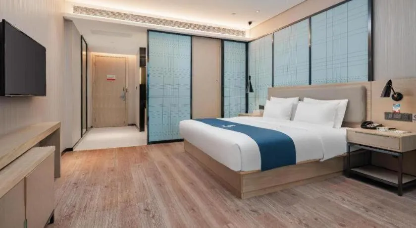 Bed in Echarm Hotel Liuzhou Liunan Wanda Plaza
