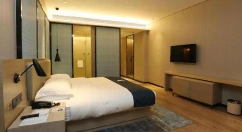 Bed in Echarm Hotel Liuzhou Liunan Wanda Plaza