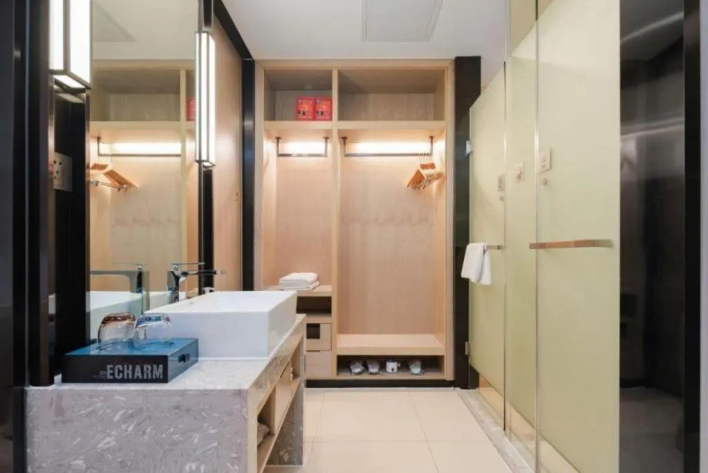 Bed in Echarm Hotel Liuzhou Liunan Wanda Plaza