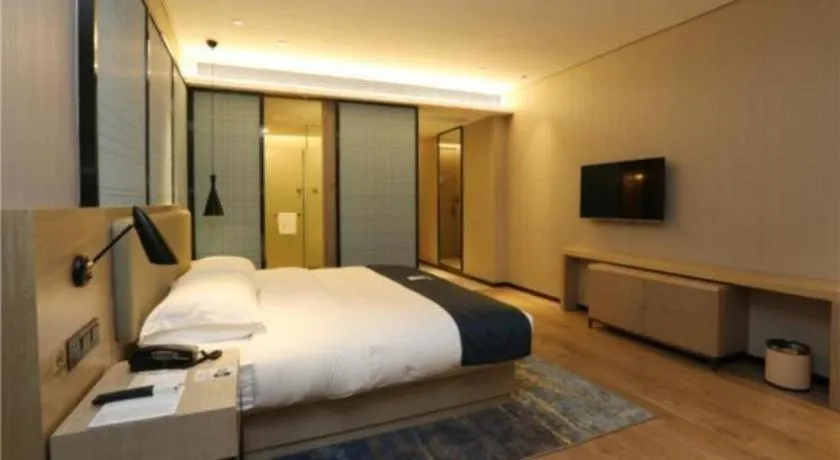 Bed in Echarm Hotel Liuzhou Liunan Wanda Plaza